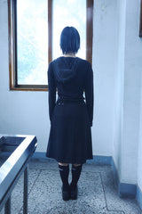 BUTTON PLEATED WRAP SKIRT / BLACK